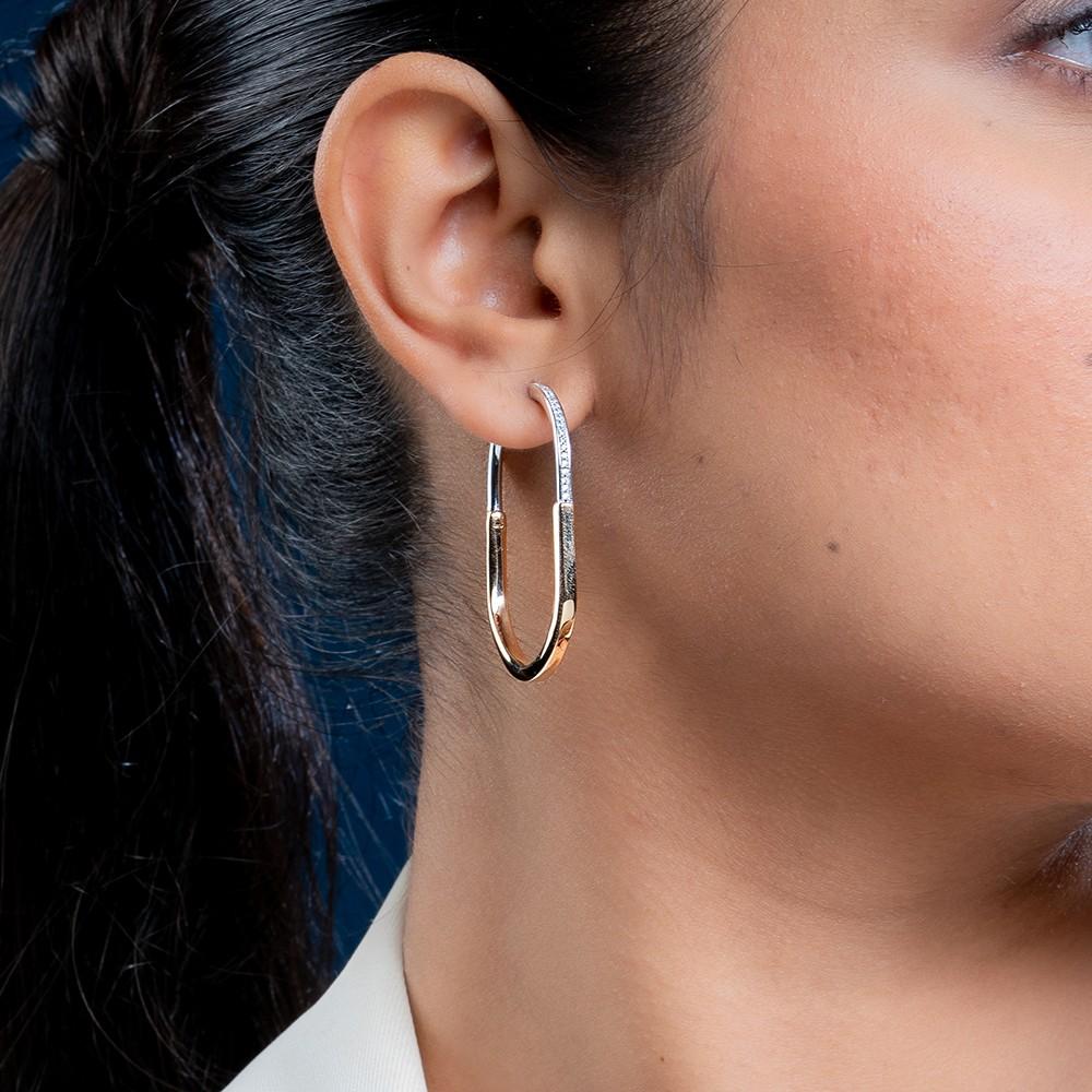 Reegalia Dual-Tone Oval Hoop Earrings – 925 Silver