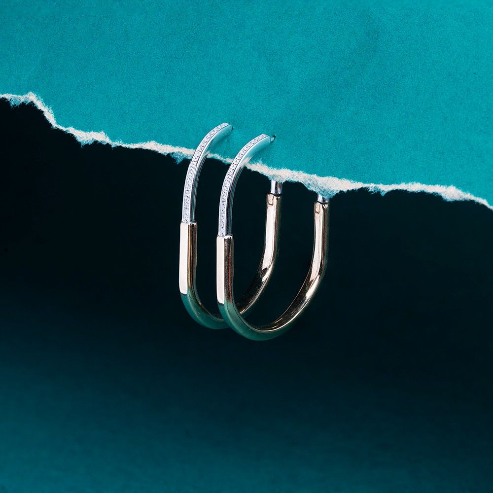 Reegalia Dual-Tone Oval Hoop Earrings – 925 Silver